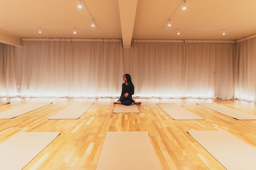 The Studio — practitioner meditating